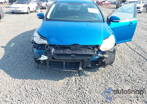 2014 Ford Focus Se z USA, uszkodzony, nr VIN 1FADP3F22EL294942